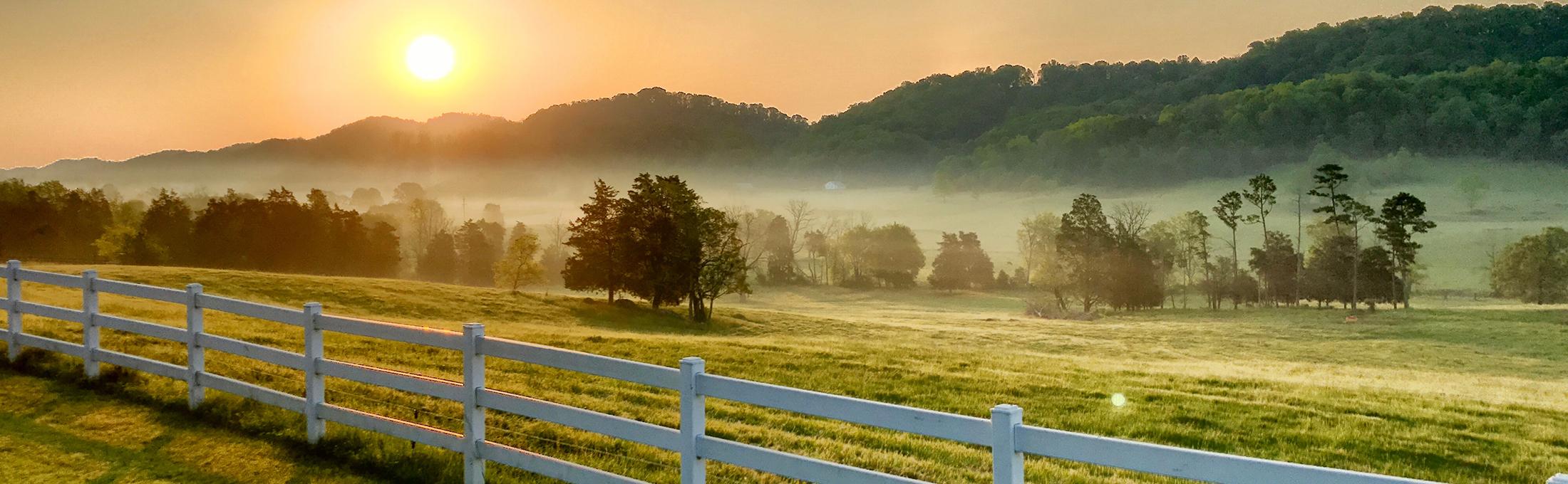 Tennessee insurance agent rural farm sunrise